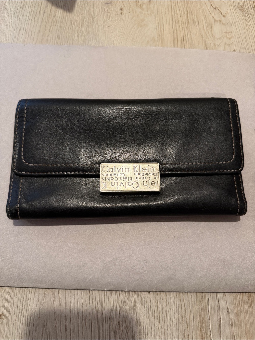 Calvin Klein Black Leather Trifold Wallet with Metal Logo Plate